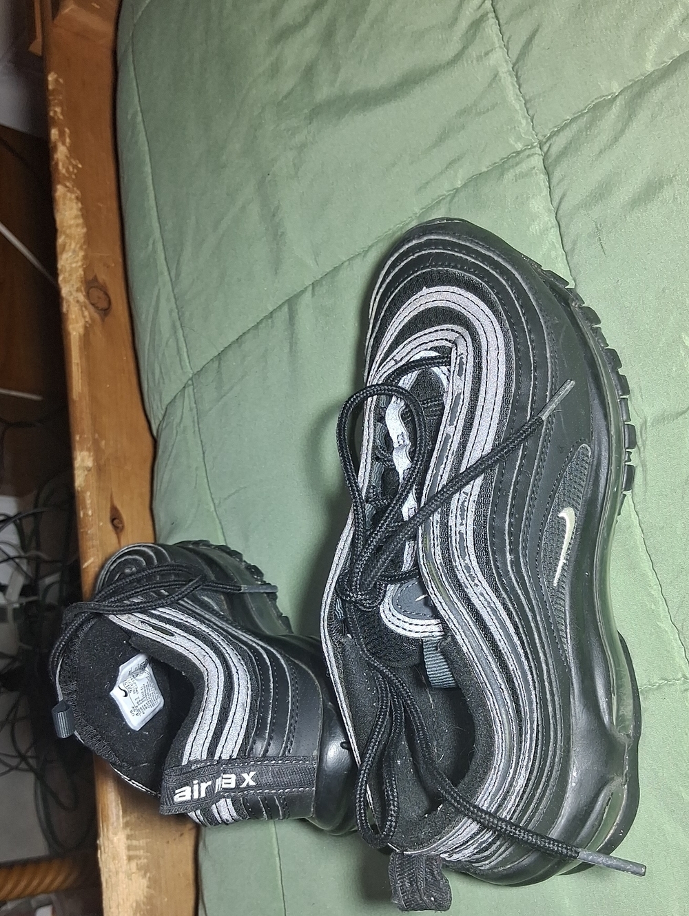 Nike Air Max 97 – Kids Size 4.Nike Kids Black Low-Top Sneakers with White Swoosh